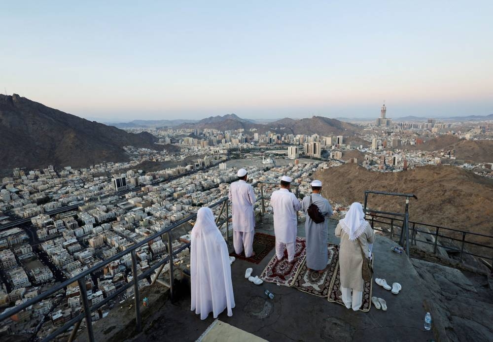Muslim pilgrims visit Mount Al-Noor, where Muslims believe Prophet Muhammad received the first words of the Quran in the holy city of Mecca July 4, 2022. — Reuters pic