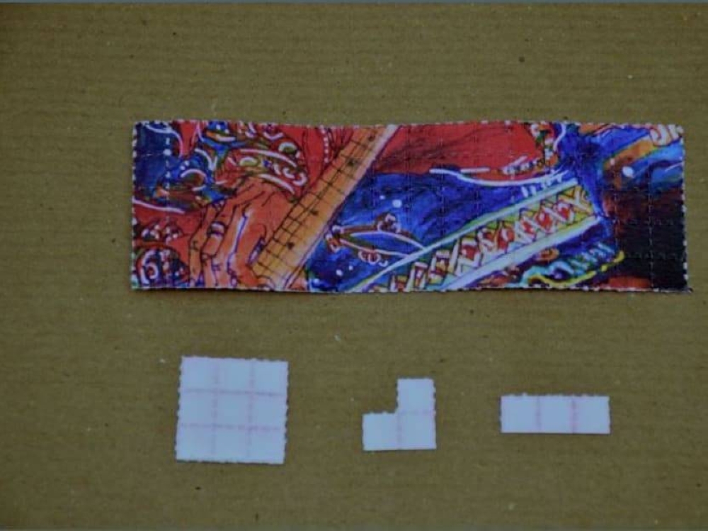 A file photo of LSD stamps. ― Central Narcotics Bureau pic via TODAY