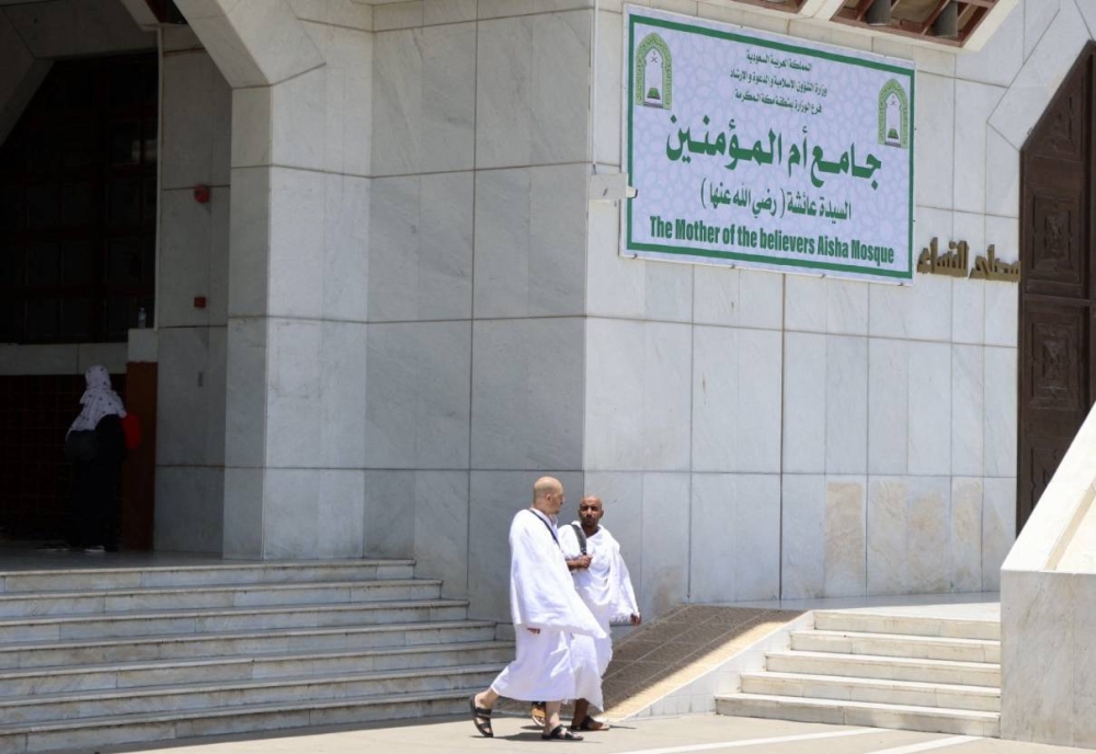 Muslim pilgrims are pictured outside the Aisha mosque in the holy city of Mecca on July 4, 2022, as Saudi Arabia hosts some one million people, including 850,000 from abroad, for the hajj pilgrimage, a key pillar of Islam that all able-bodied Muslims are required to perform at least once in a lifetime. — AFP pic