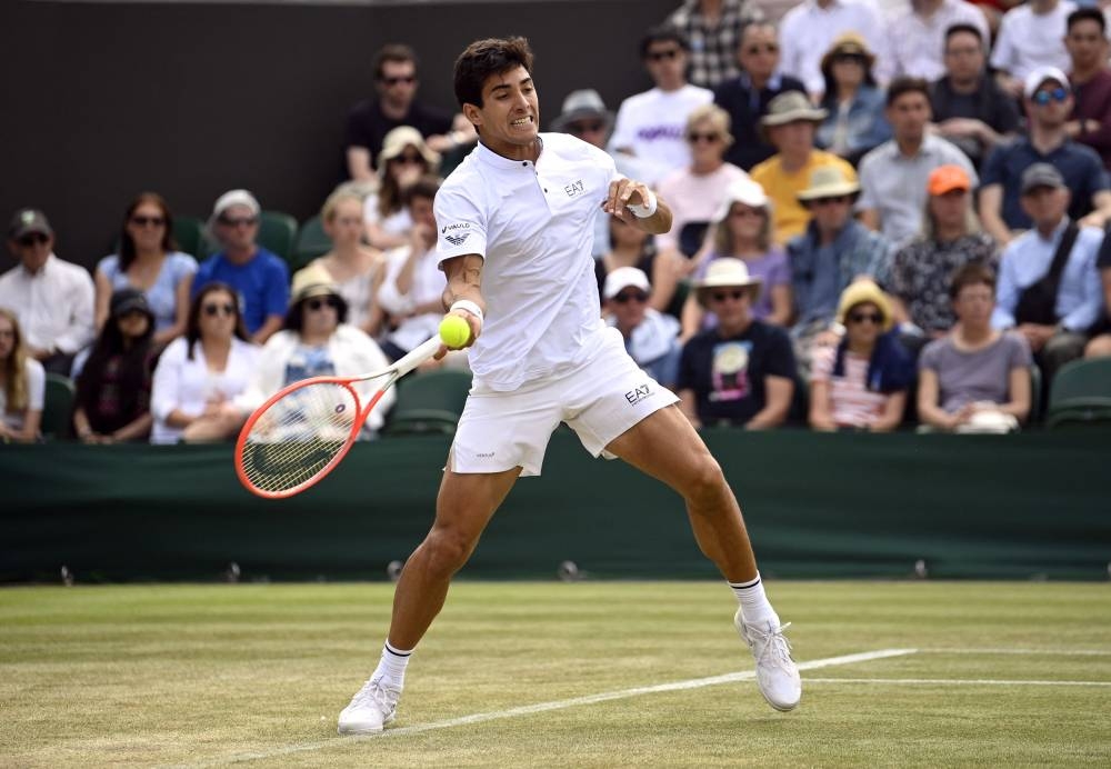 Chile’s Cristian Garin in action during his fourth round match against Australia’s Alex de Minaur in London, Britain, July 4, 2022. — Reuters pic 