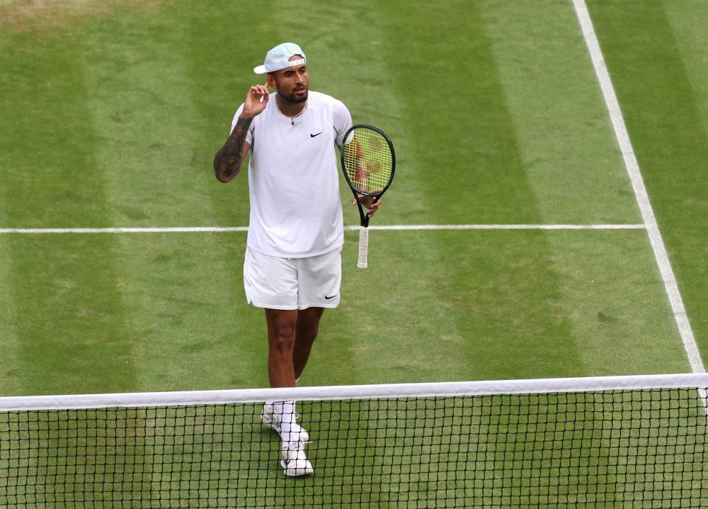 Nick Kyrgios celebrates winning his fourth round match against Brandon Nakashima at the All England Lawn Tennis and Croquet Club, London July 4, 2022. — Reuters pic 