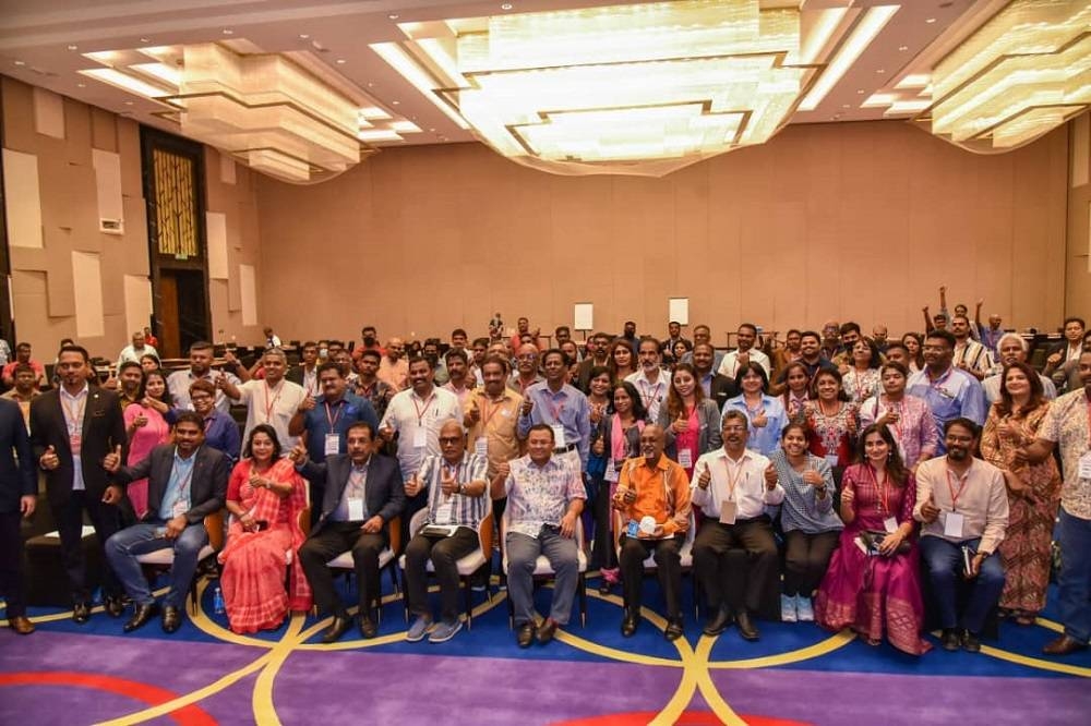 Charles Santiago (seated, fourth from left) and Selangor Menteri Besar Datuk Seri Amirudin Shari (seated, fifth from left) post for a group picture with participants at the 'Shaping a Malaysian Indian Development Narrative' workshop. — Picture courtesy of Charles Santiago