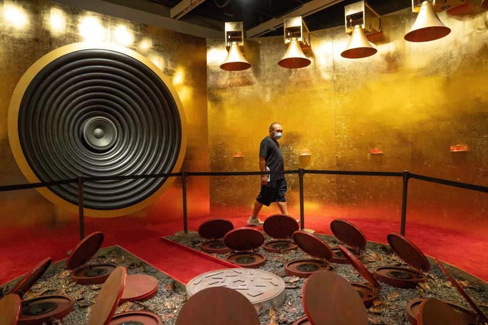 A man looks at ‘A Grandiose Fanfare’ by GayBird during the opening day of the Hong Kong Palace Museum in Hong Kong, July 3, 2022. — AFP pic 