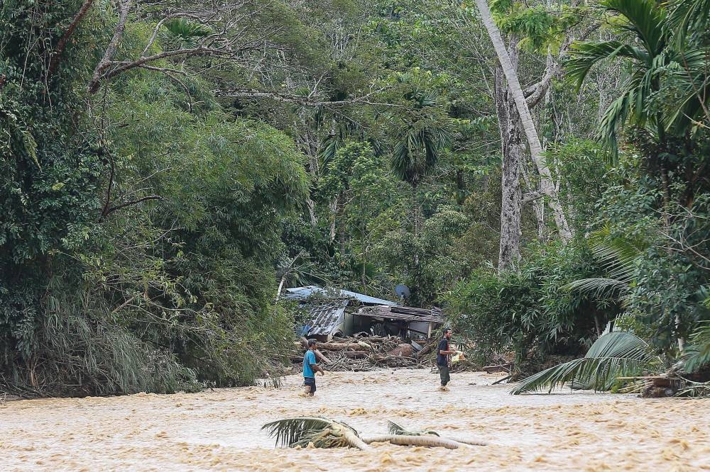 A destroyed house is pictured at the end of the river after flash floods hit Kampung Bukit Iboi and its surrounding areas in Baling, Kedah July 5, 2022. — Picture by Sayuti Zainudin