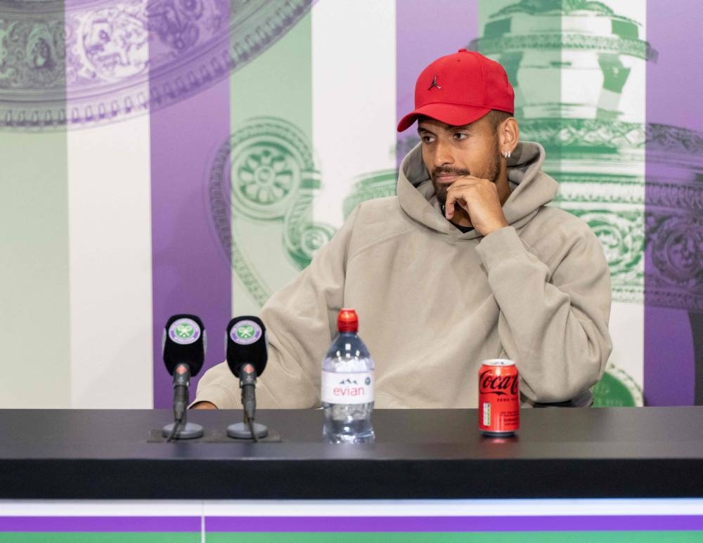 Australia’s Nick Kyrgios holds a press conference on the eighth day of the 2022 Wimbledon Championships at The All England Tennis Club in Wimbledon, July 4, 2022. — AFP pic 