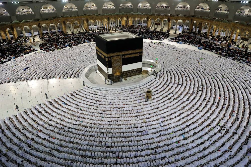 Muslim worshippers pray around the Kaaba at the Grand Mosque in Saudi Arabia's holy city of Mecca on July 5, 2022. ― AFP pic