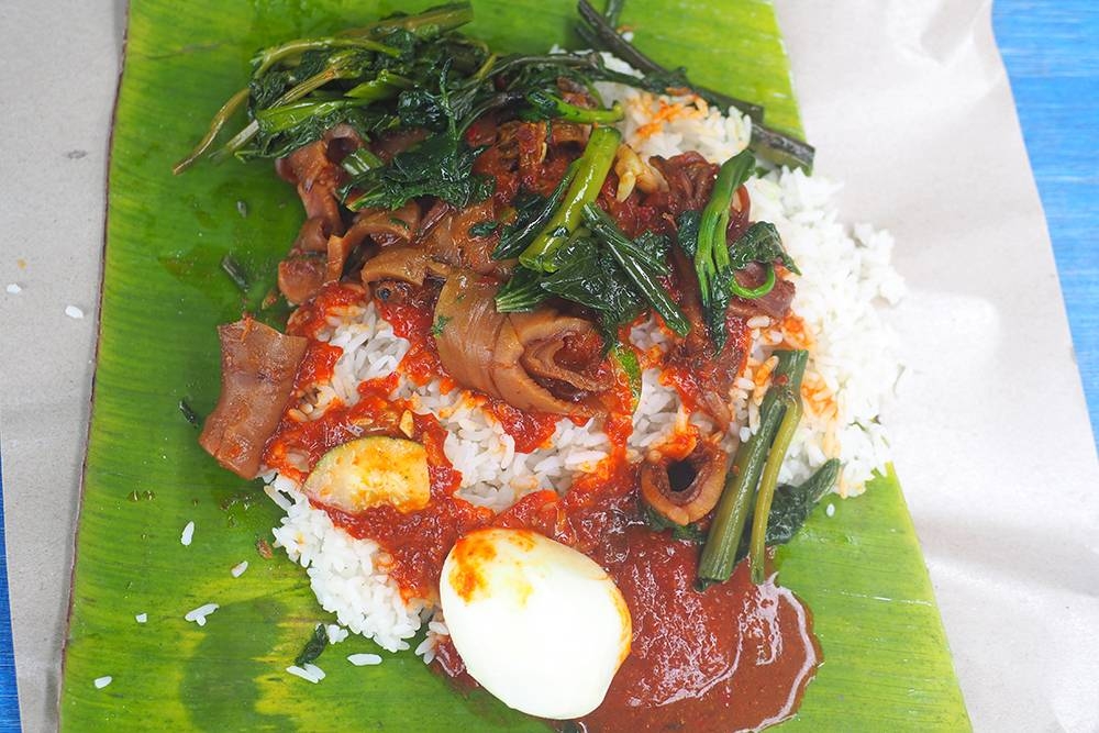 Start the day with this satisfying 'nasi lemak' with tender 'sambal sotong' from Nasi Lemak Kak Chuk. — Pictures by Lee Khang Yi