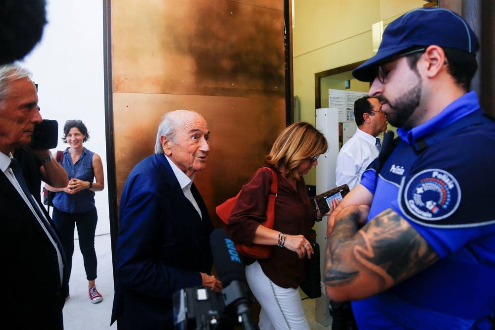 Former Fifa President Sepp Blatter, his daughter Corinne Blatter and his lawyer Lorenz Erni arrive at the Swiss Federal Criminal Court in Bellinzona, Switzerland July 8, 2022. — Reuters pic 
