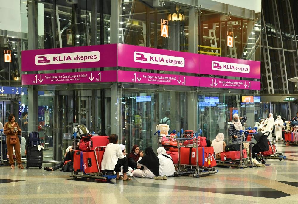 A total of 380 prospective Haj pilgrims were stranded at Kuala Lumpur International Airport yesterday after they were believed to have been cheated by a travel agency. — Bernama pic 