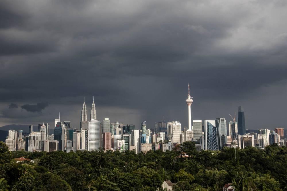 A view of the city skyline during monsoon season in Kuala Lumpur on October 21, 2021. — Picture by Firdaus Latif   