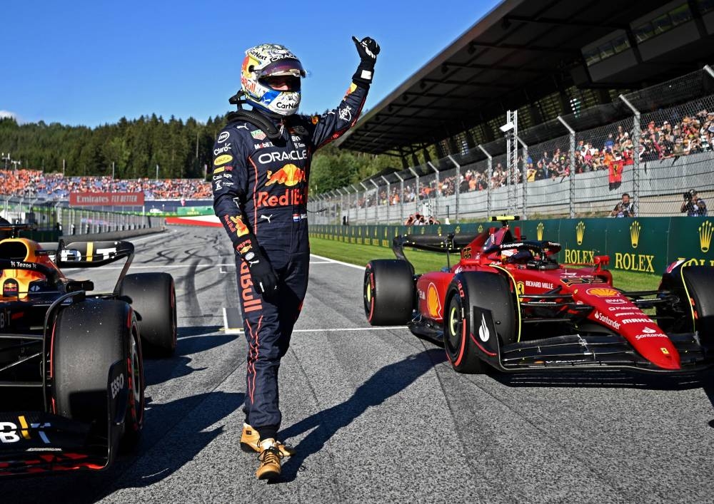 Red Bull's Max Verstappen celebrates after qualifying on pole for the sprint race in Spielberg, Austria July 8, 2022. ― Pool via Reuters/Christian Bruna