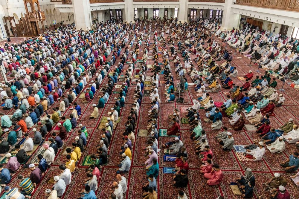People attend Hari Raya Aidiladha prayers in Kuala Lumpur on July 10, 2022. — Picture by Firdaus Latif