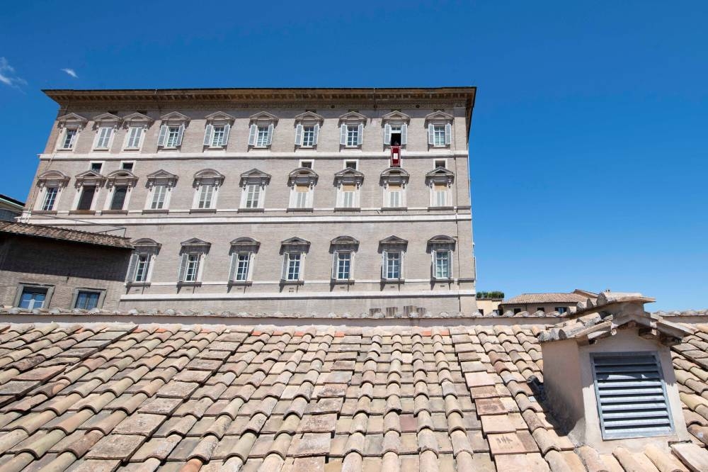 Pope Francis leads the Angelus prayer from his window, at the Vatican July 10, 2022.  — Vatican Media handout via Reuters pic