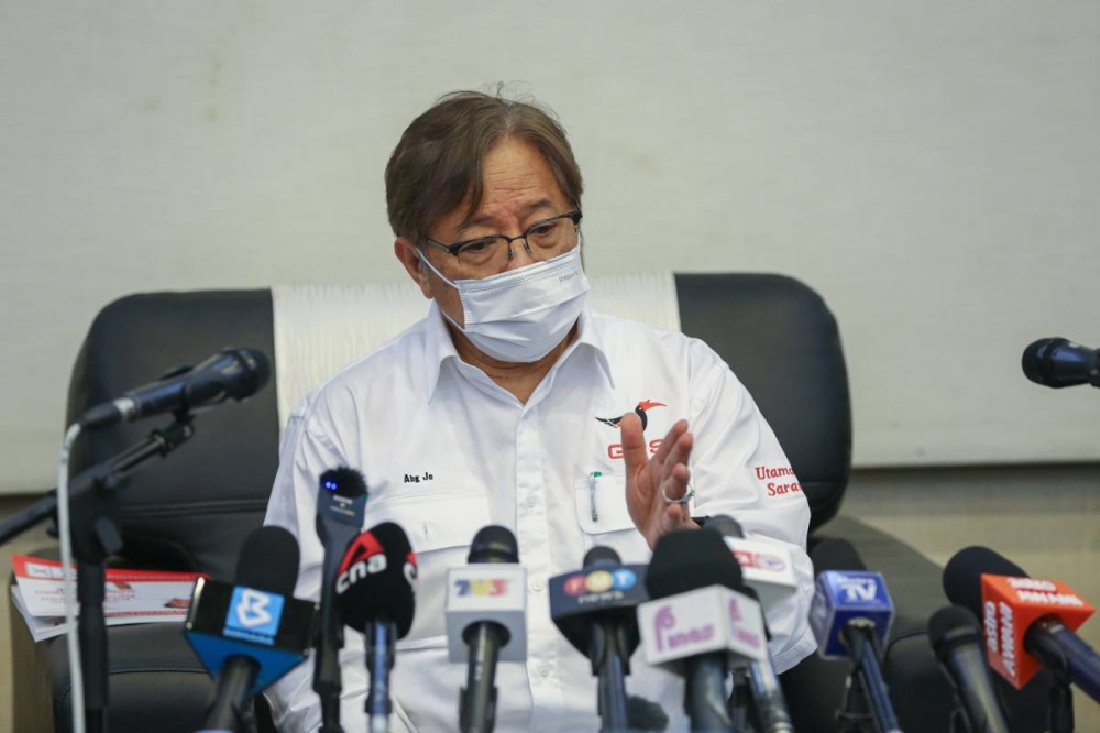 Tan Sri Abang Johari Openg speaks during a press conference at Borneo Convention Centre in Kuching December 8, 2021. — Picture by Yusof Mat Isa