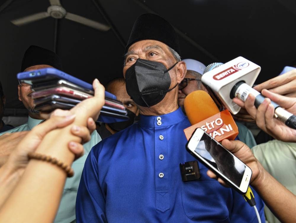 Perikatan Nasional (PN) chairman Tan Sri Muhyiddin Yassin speaks to the media at the Perak PN Aidiladha Kenduri Rakyat (People’s Feast) in Kampung Manjoi, Ipoh July 11, 2022. — Bernama pic