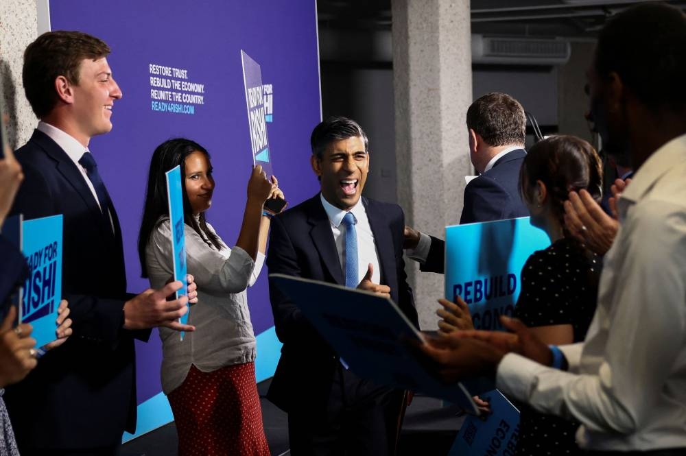Former Chancellor of the Exchequer Rishi Sunak gestures at an event to launch his campaign to be the next Conservative leader and Prime Minister, in London, Britain, July 12, 2022. — Reuters pic