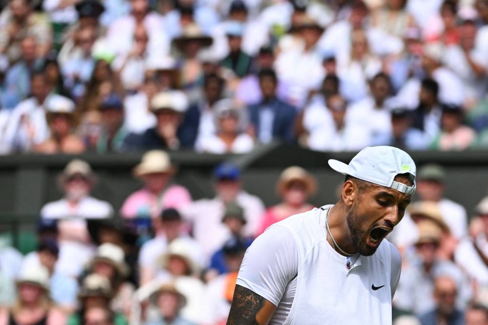 Australia’s Nick Kyrgios reacts as he plays against Serbia’s Novak Djokovic during their men’s singles final tennis match at the 2022 Wimbledon Championships, southwest London, July 10, 2022. — AFP pic 