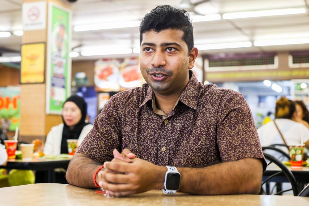 Yoga Kannan speaks during an interview at Kanna Curry House in Petaling Jaya July 6, 2022. — Picture by Ahmad Zamzahuri