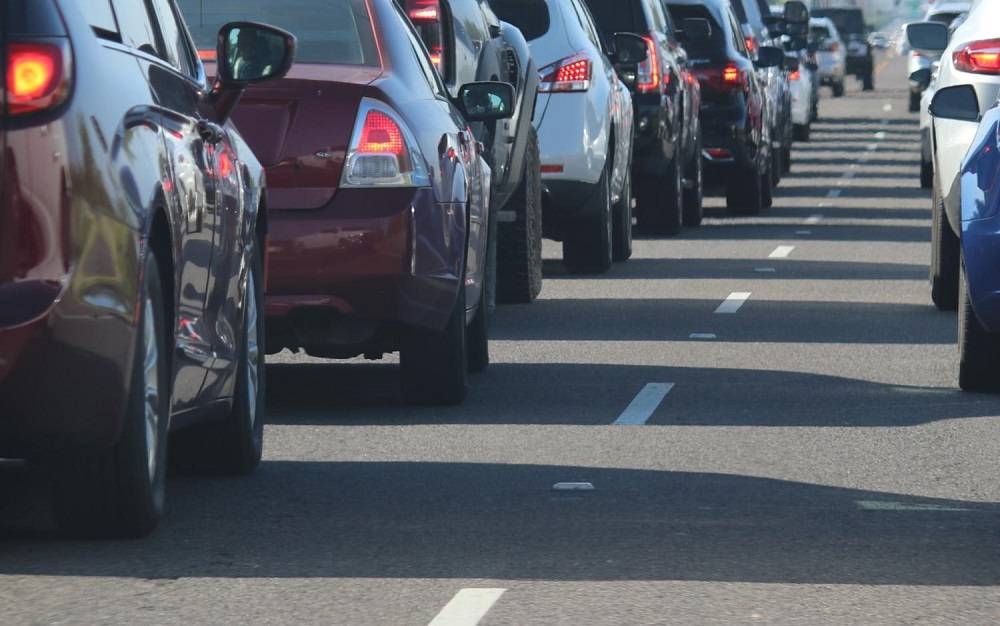 Motorists on the Second Link have been known to jump the queue by driving their cars on designated bus or emergency lanes before merging back into the line for cars. — Unsplash pic