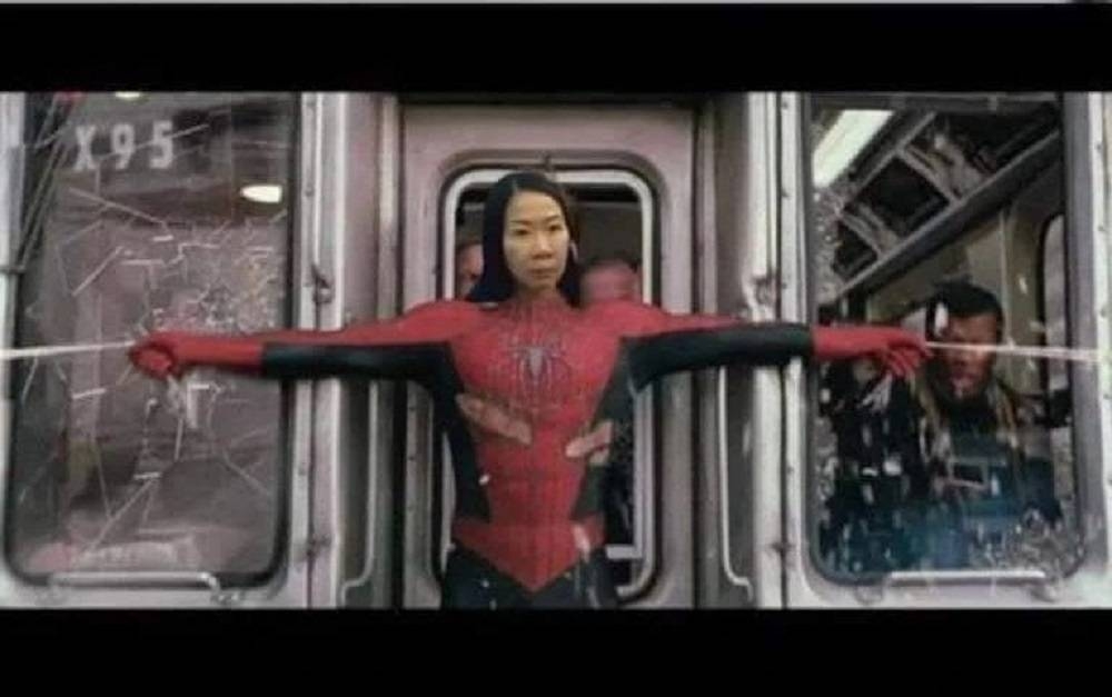 A meme posted by Wake Up Singapore on Instagram, depicting an angry woman who tried to block a car with her body as Spider-Man, in a famous movie sequence where the superhero holds back a subway train. — Picture via Instagram/Wake Up Singapore