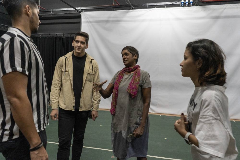 As acting coach, Jo gives feedback to one of the actors during one of the rehearsals. — Picture via Shafwan Zaidon
