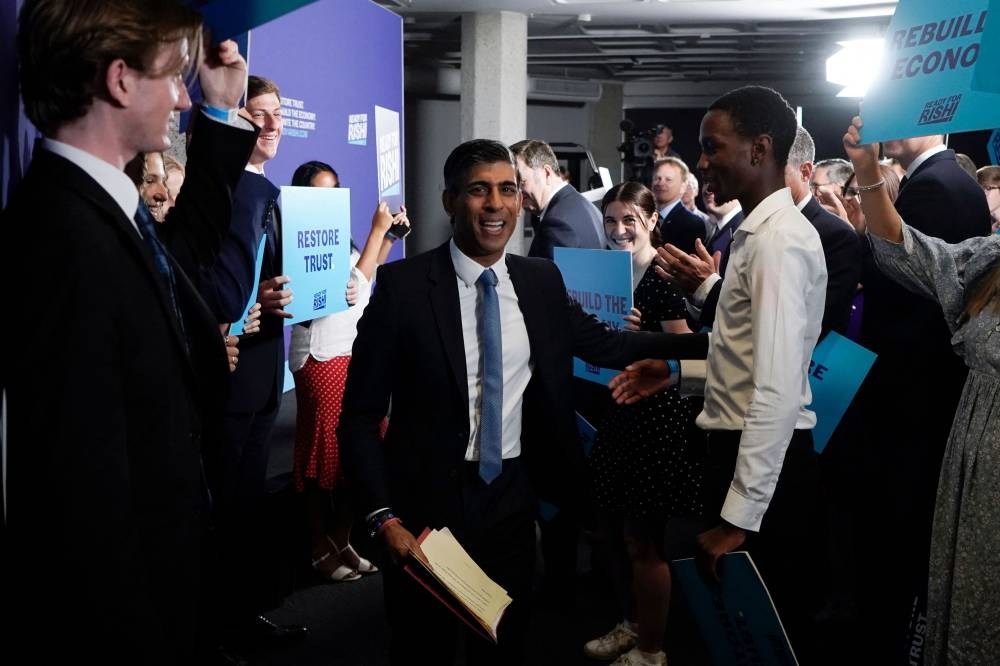Rishi Sunak, Britain's former chancellor of the exchequer and candidate to become the next prime minister, leaves after delivering a speech at the Queen Elizabeth II Centre in London July 12, 2022. — AFP pic