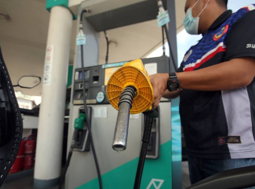 The Finance Ministry, in a statement today, said RON95 petrol and diesel will remain at RM2.05 per litre and RM2.15 per litre respectively even though the real market price of the two products had risen beyond the current ceiling price. — Picture by Farhan Najib