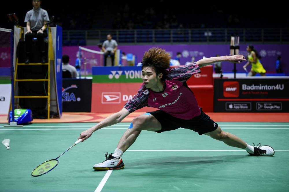 Playing at the Singapore Indoor Stadium, world number 48 Ng Tze Yong deserves credit for not capitulating in the second game when he found himself trailing to the more experienced Angus Ng Ka Long, who was the losing finalist at the Malaysia Masters on Sunday. — Bernama pic