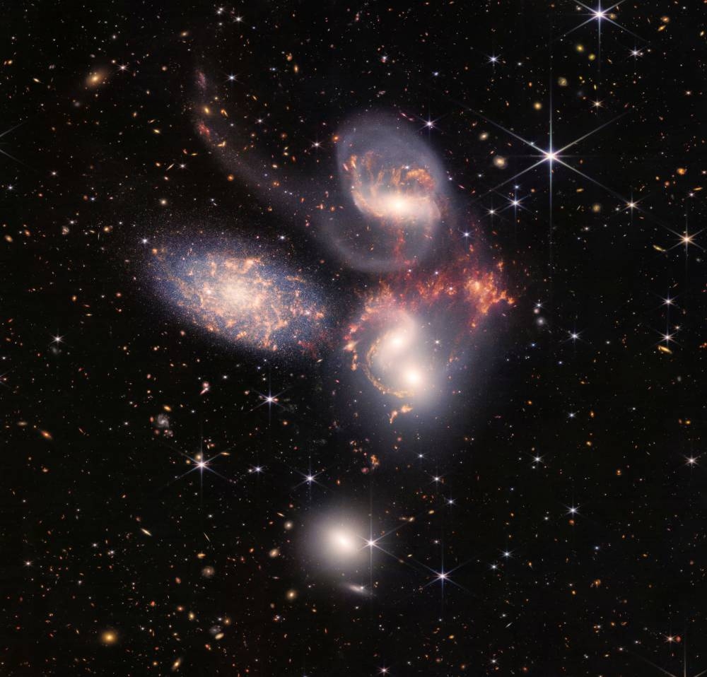A group of five galaxies that appear close to each other in the sky are seen in a mosaic or composite of near and mid-infrared data from Nasa's James Webb Space Telescope. – Nasa, ESA, CSA, STScI, Webb ERO Production Team/Handout via Reuters