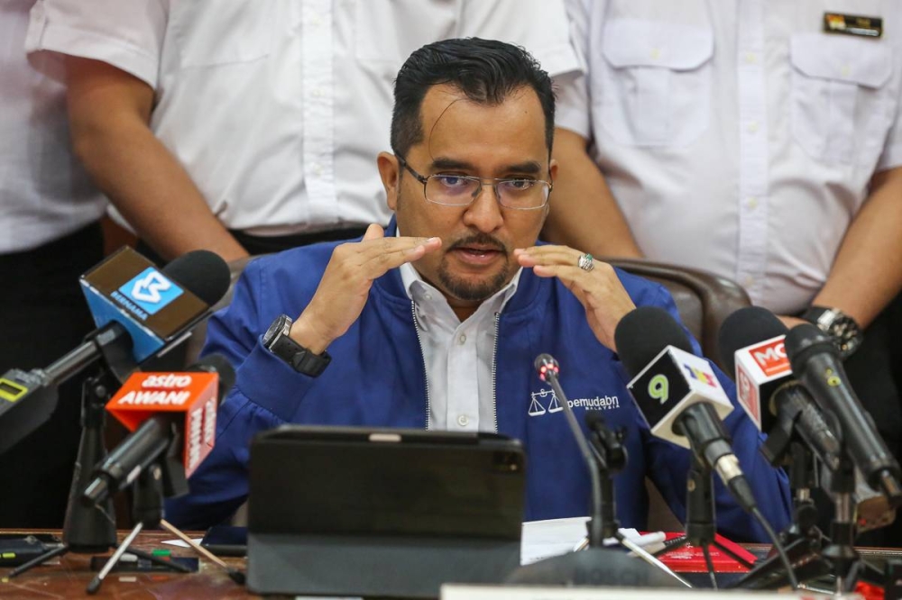 Umno Youth chief Asyraf Wajdi Dusuki speak during a press conference at party headquarters in Kuala Lumpur June 22, 2022. Picture by Yusof Mat Isa