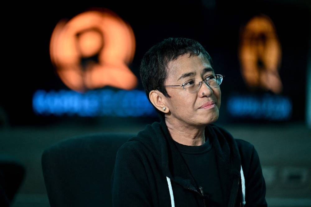 In this photo taken on July 12, 2022, Maria Ressa speaks during an interview with AFP at Rappler's office in Pasig, Metro Manila. — AFP pic