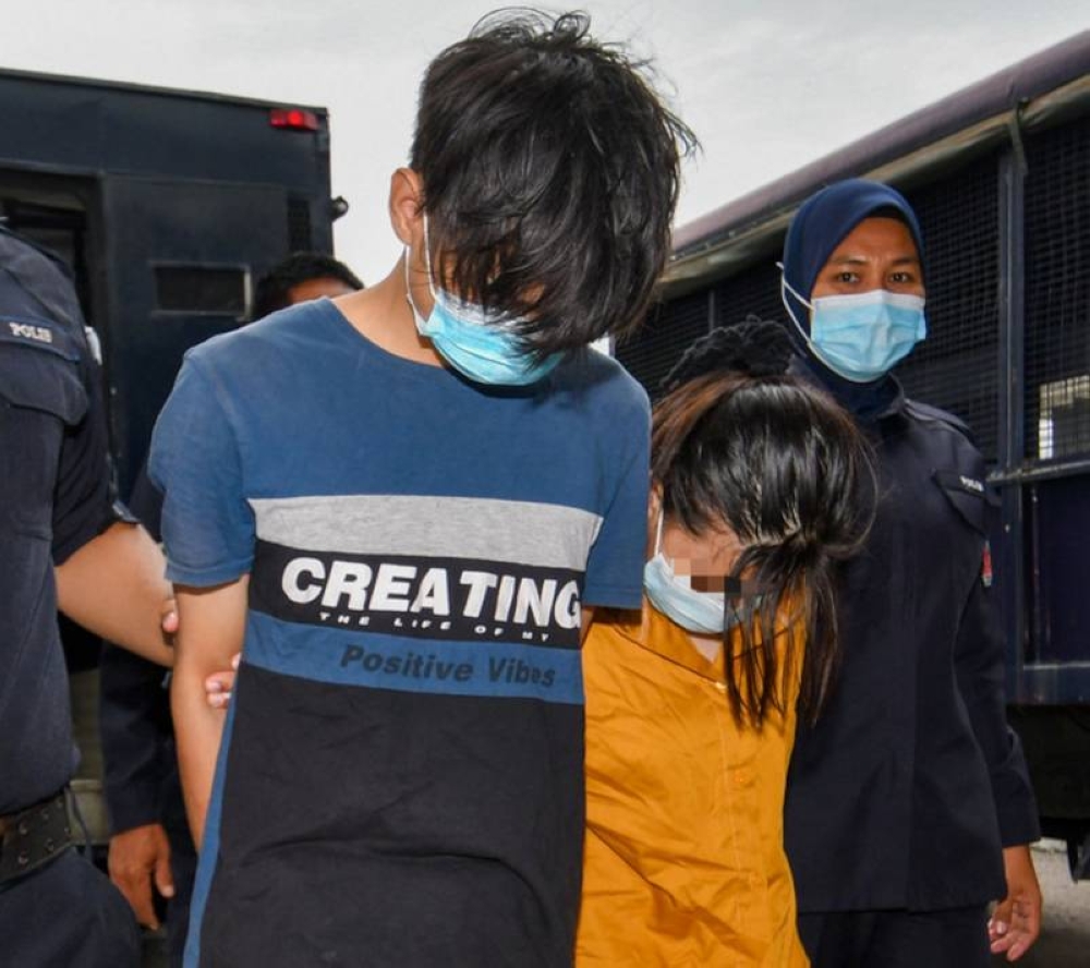 Maizatul Shima Abdullah, 21, and Muhammad Zaim Syakir Shaari, 20, nodded their understanding after the charge against them was read out together before Magistrate Muhammad Fitri Mokhtar. — Bernama pic 