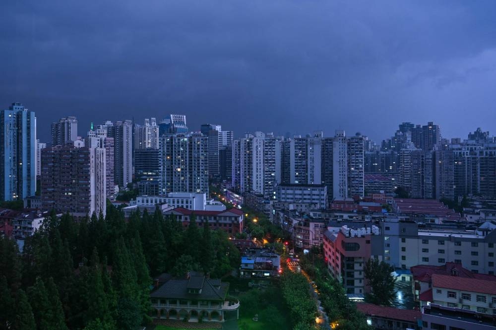 A general view shows a thunderstorm over Shanghai on July 11, 2022. — AFP pic