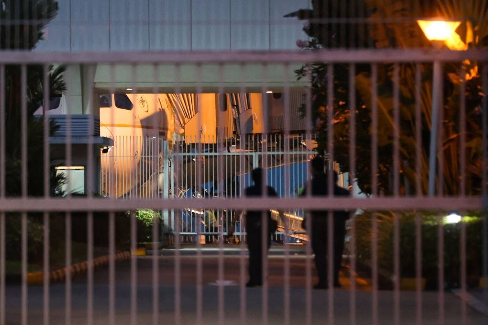 A Saudi airlines plane, believed to be carrying Sri Lankan President Gotabaya Rajapaksa arrives on the tarmac at Singapore's Changi Airport July 14, 2022. — Reuters pic