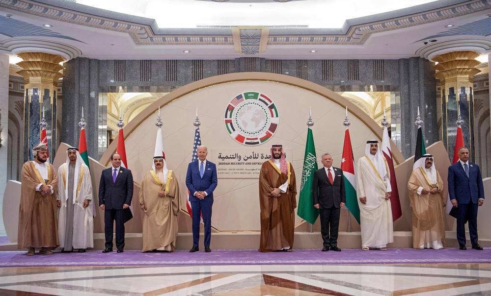 This handout picture released by the Saudi Royal Palace shows (left to right) Asaad bin Tariq al-Said, Omani Deputy Prime Minister for International Relations and Cooperation Affairs and the Special Representative of the Sultan; UAE President Sheikh Mohamed bin Zayed al-Nahyan; Egypt’s President Abdel Fattah al-Sisi; Bahrain’s King Hamad bin Isa bin Salman al-Khalifa; US President Joe Biden; Saudi Crown Prince Mohammed bin Salman; Jordan’s King Abdullah II; Qatar's Emir Sheikh Tamim bin Hamad al-Thani; Kuwait's Crown Prince Meshal al-Ahmad al-Jaber al-Sabah; and Iraq’s Prime Minister Mustafa Kadhemi posing together for the family photo during the Jeddah Security and Development Summit (GCC 3) at a hotel in Saudi Arabia's Red Sea coastal city of Jeddah on July 16, 2022. — AFP pic