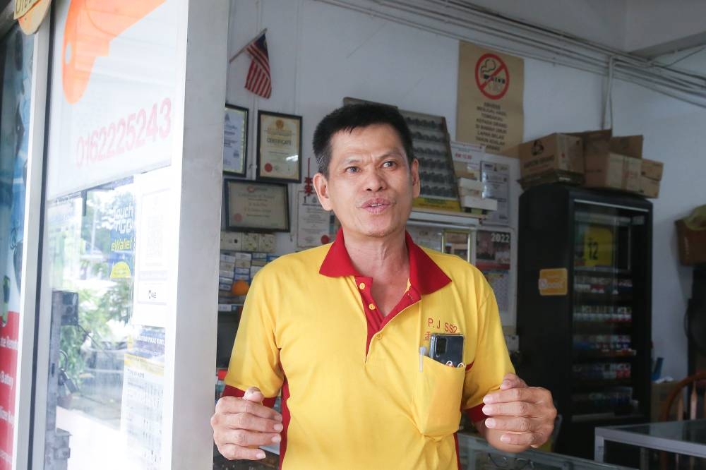 Anthony Ng runs a locksmith shop in Taman Paramount, June 15, 2022. — Picture by Choo Choy May