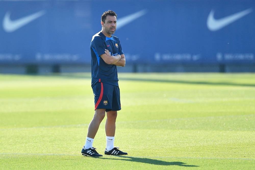 Barcelona’s Spanish coach Xavi looks on during a training session at the Joan Gamper training ground in Sant Joan Despi, near Barcelona on July 12, 2022. — AFP pic
