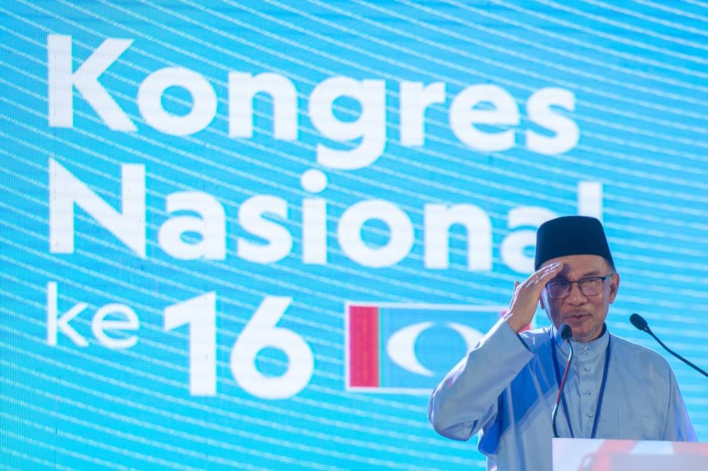 PKR president, Datuk Seri Anwar Ibrahim delivers his speech during the 16th PKR Congress at IDCC in Shah Alam, 16 July 2022. — Picture by Shafwan Zaidon