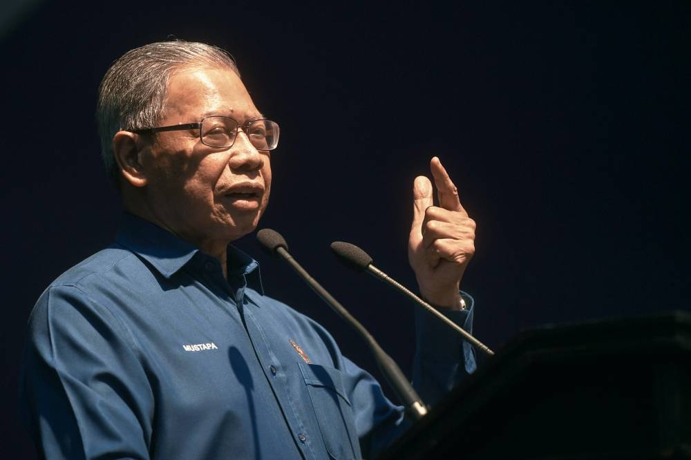 Minister in the Prime Minister’s Department (Economy) Datuk Seri Mustapa Mohamed delivers a speech during the Keluarga Malaysia Career Carnival at Universiti Sains Malaysia Health Campus in Kota Baru July 17, 2022. — Bernama pic