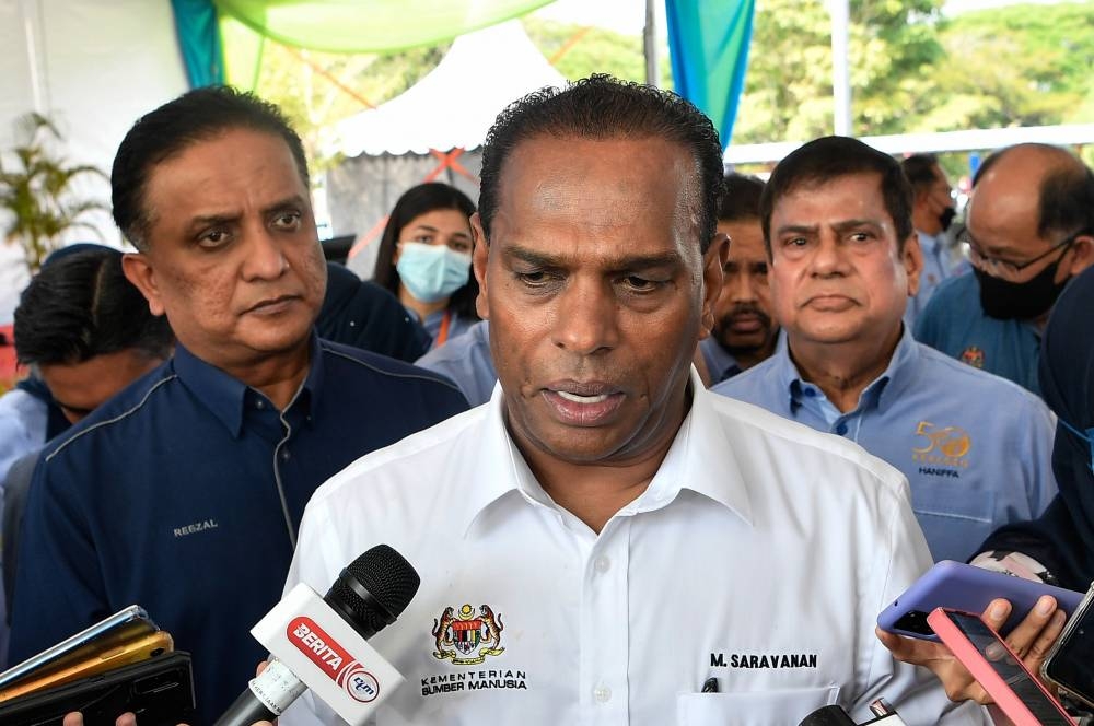 Human Resources Minister Datuk Seri M. Saravanan speaks to the media after the signing ceremony of the memorandum of understanding (MoU) between the Social Security Organisation (Socso) and Flex Penang, as part of efforts to strengthen job placement for persons with disabilities (PwD) at the Flex Plan 5 factory in Kepala Batas July 17, 2022. — Bernama pic