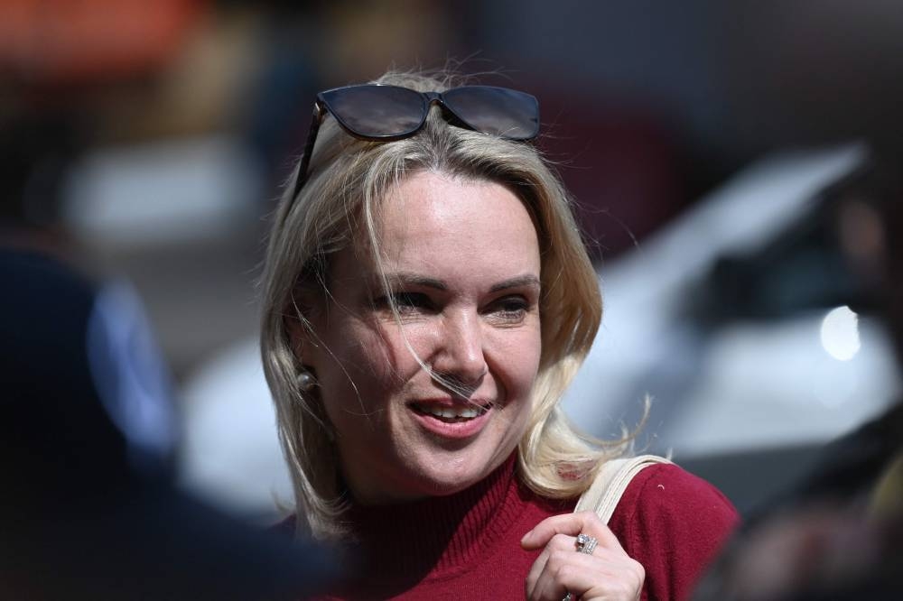 Marina Ovsyannikova, the journalist who protested against the Russian military action in Ukraine during a prime-time news broadcast on state television, appears outside the Basmanny district court, in Moscow on July 13, 2022. — AFP pic