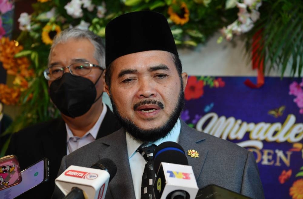 Deputy Minister of Agriculture and Food Industries Datuk Nik Muhammad Zawawi Salleh speaks to the media after the pre-launch of the Agro-Food Floriculture Park in conjunction with MAHA 2022 in Putrajaya, July 18, 2022. — Bernama pic 