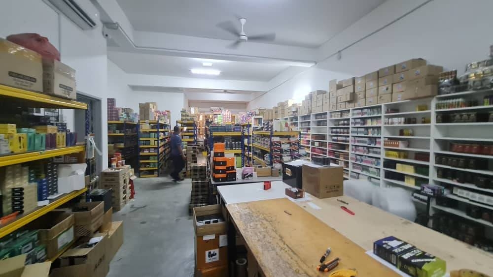 The seized 25,306 boxes and bottles of vape suspected to contain nicotine. — Picture courtesy of Royal Malaysia Police (PDRM)