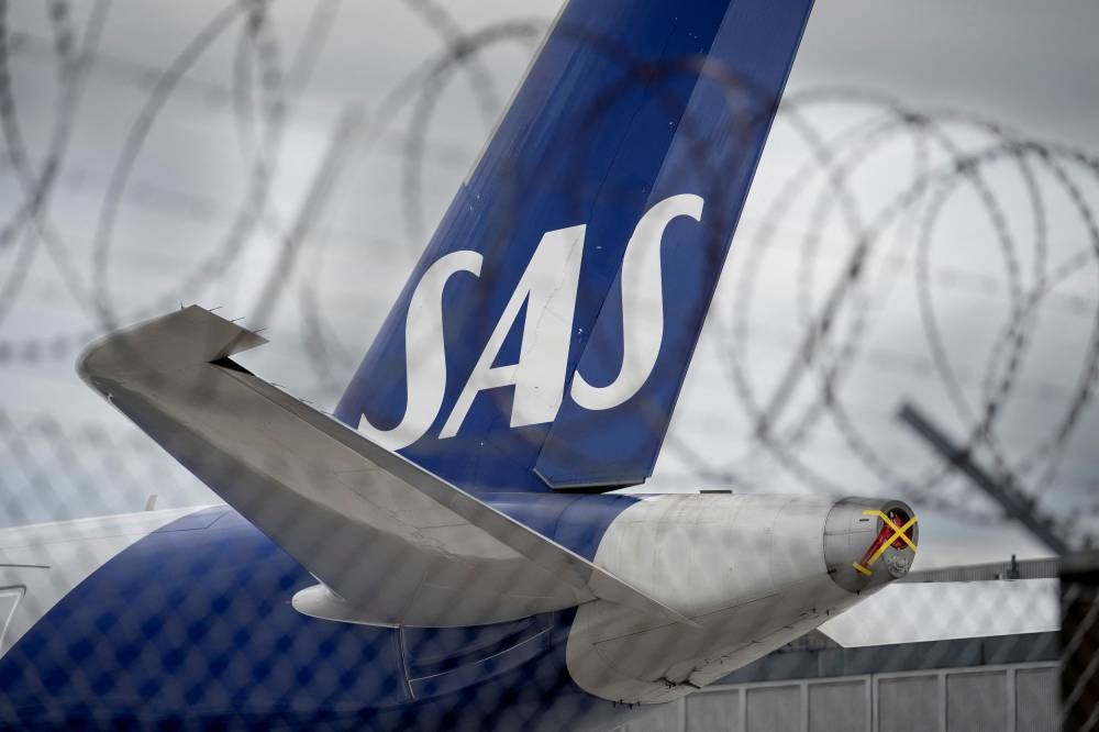 A majority of SAS pilots in Sweden, Denmark and Norway walked out on July 4 triggering a strike that SAS has said cost it between US$94 million and US$123 million a day. — Picture by Ritzau Scanpix/Liselotte Sabroe via Reuters
