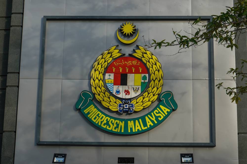 The Immigration Department logo is seen at its headquarters in Putrajaya May 11, 2022. — Picture by Shafwan Zaidon