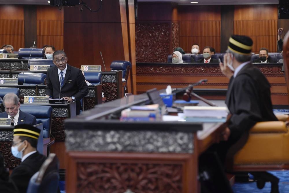 Energy and Natural Resources (KeTSA) minister Datuk Seri Takiyuddin Hassan speaks at the Dewan Rakyat in Kuala Lumpur July 18, 2022. — Bernama pic