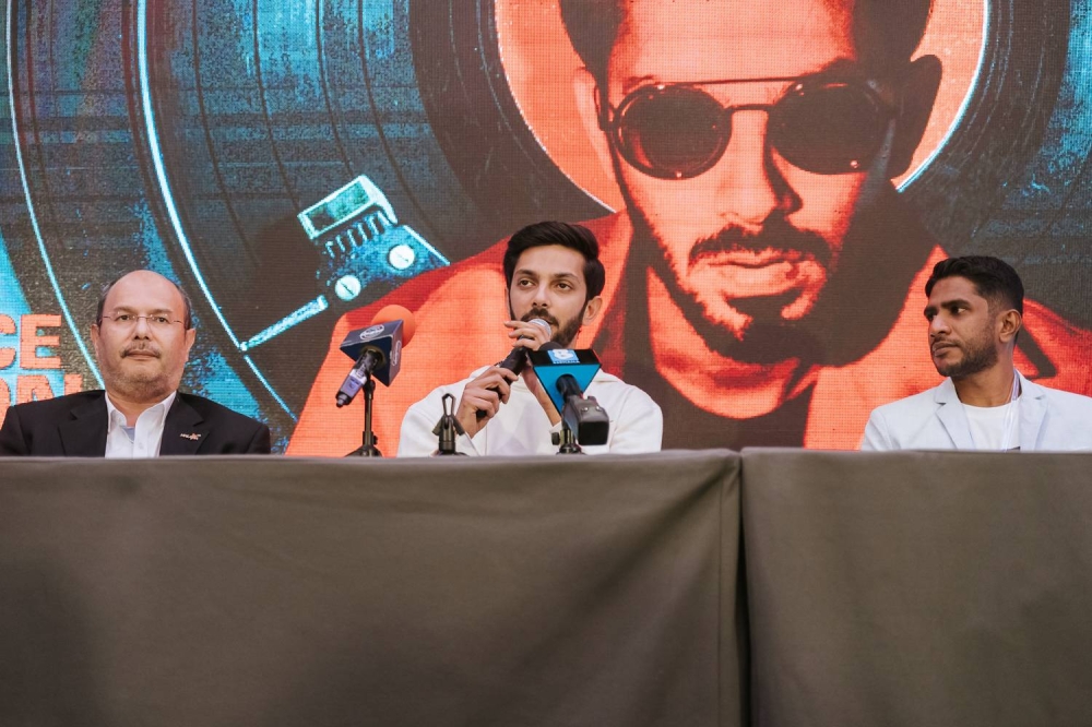 Anirudh (centre), taking questions from the members of the media. — Picture by Devan Manuel.