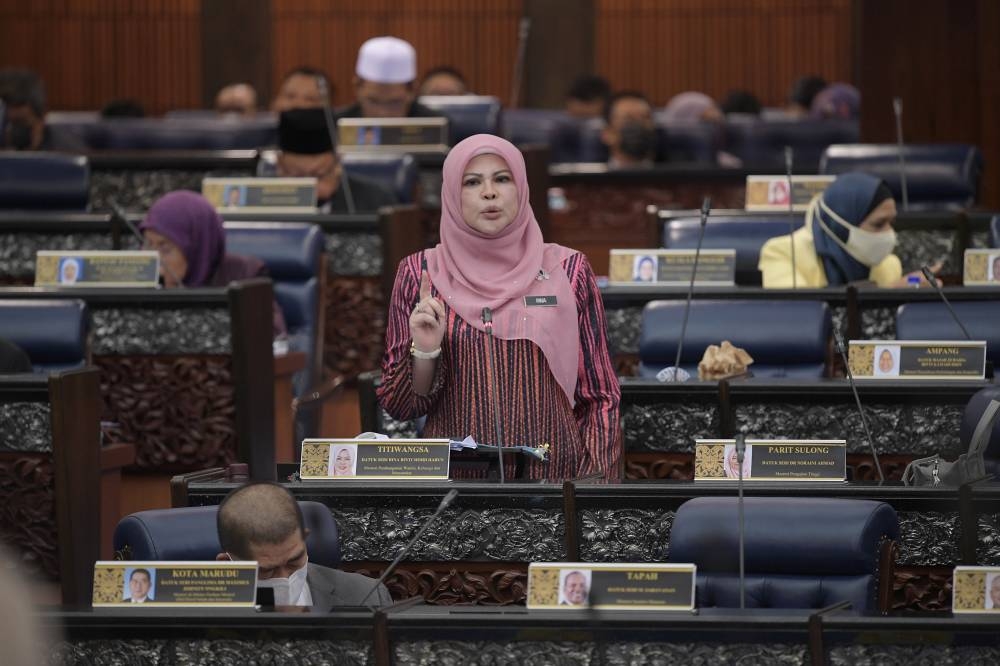 Women, Families and Community Development Minister Datuk Seri Rina Harun speaks at the Dewan Rakyat in Kuala Lumpur July 20, 2022. — Bernama pic