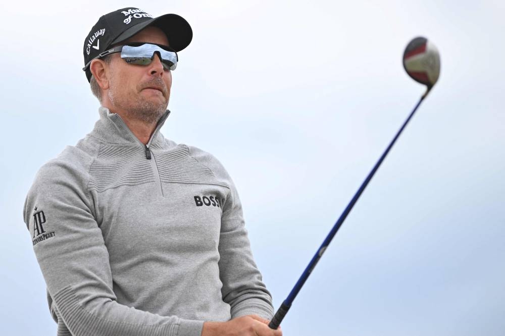 In this file photo taken on July 14, 2022 Sweden's Henrik Stenson watches his drive from the 14th tee during his opening round on the first day of The 150th British Open Golf Championship on The Old Course at St Andrews. Henrik Stenson has been stripped of the captaincy of the European Ryder Cup team, team chiefs announced on on July 20, 2022. — AFP pic