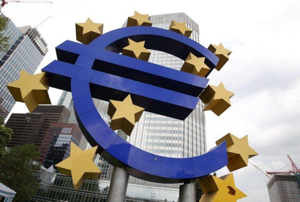 The euro logo is seen in front of the European Central Bank (ECB) building in Frankfurt. ― AFP file pic